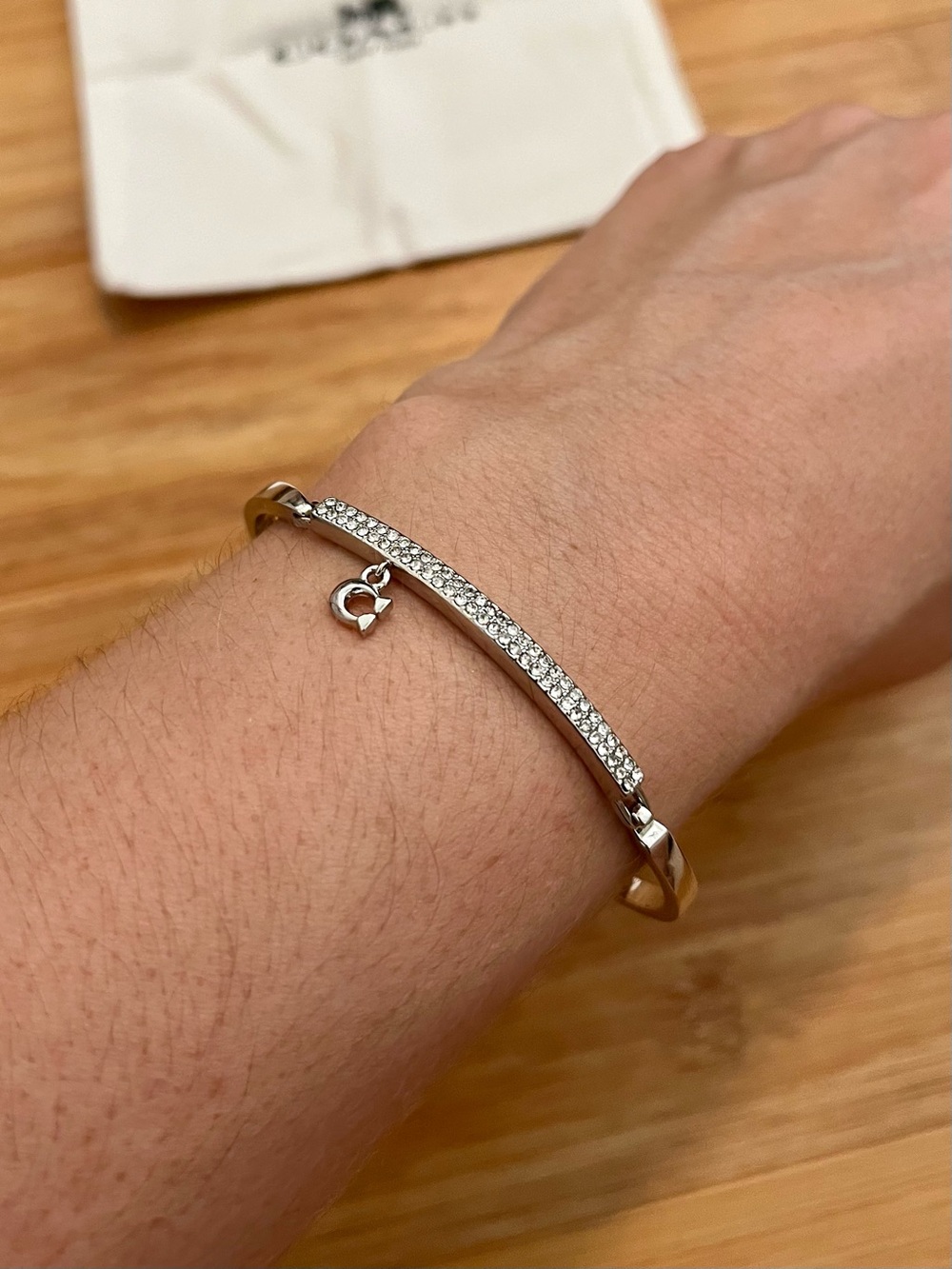 Coach Silver Tone Pavé Crystal Hinged Bangle Bracelet w/ C Charm & dust bag